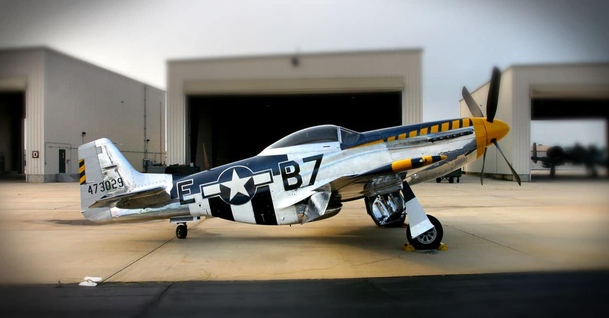 P-51-A P-51 Mustang displaying World War II D-Day markings is parked at the Atlantic City Air National Guard Base