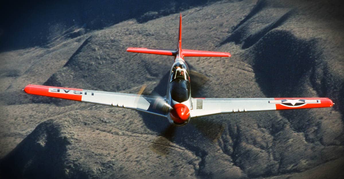 -51-Head-on shot of a World War II era P-51 Mustang while flying over the Arizona desert during a USAF Heritage Conference 2002