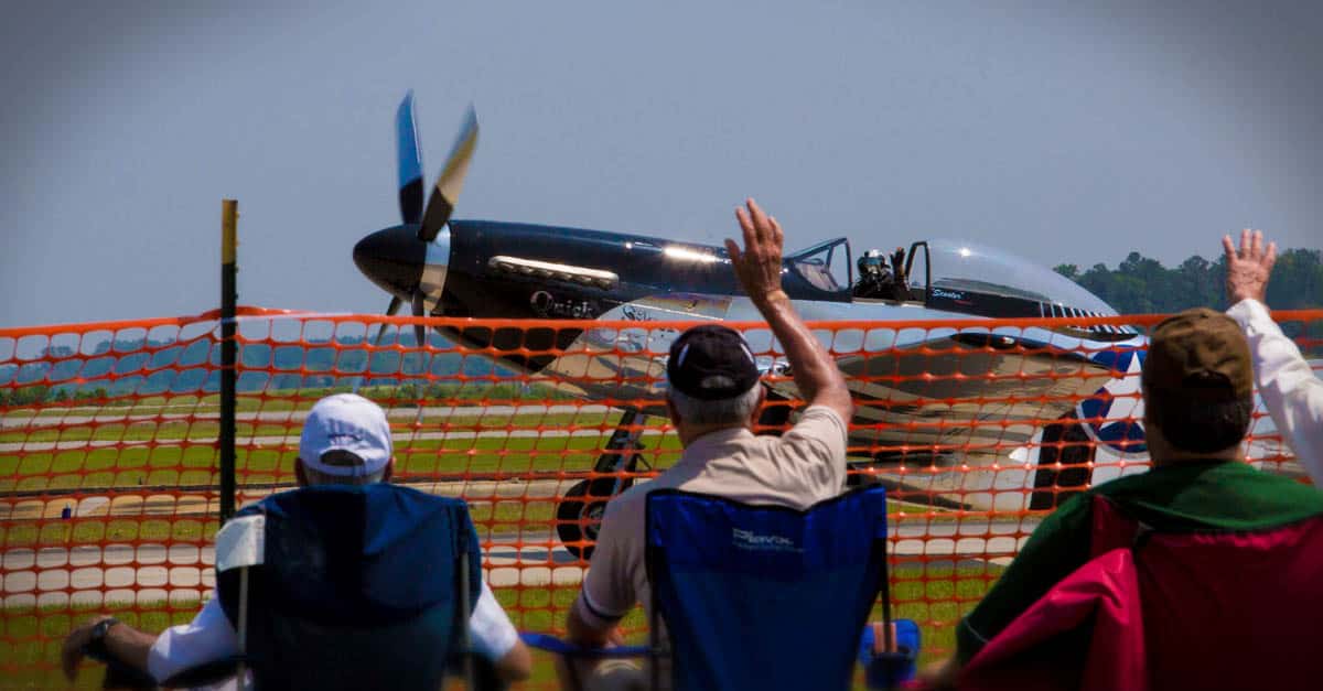 P-51-P-51 Mustang pilot waves to the crowd attending the 2017 Marine Corps Air Station (MCAS) Beaufort Air Show training day