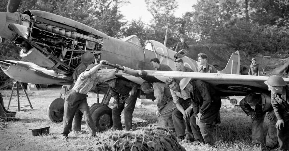 Supermarine Spitfire- Men of an RAF Repair and Salvage Unit working on a damaged Supermarine Spitfire Mk IX