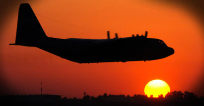 C-130_ A U.S. Air Force C-130 Hercules assigned to the 777th Expeditionary Airlift Squadron here takes off into the sunset