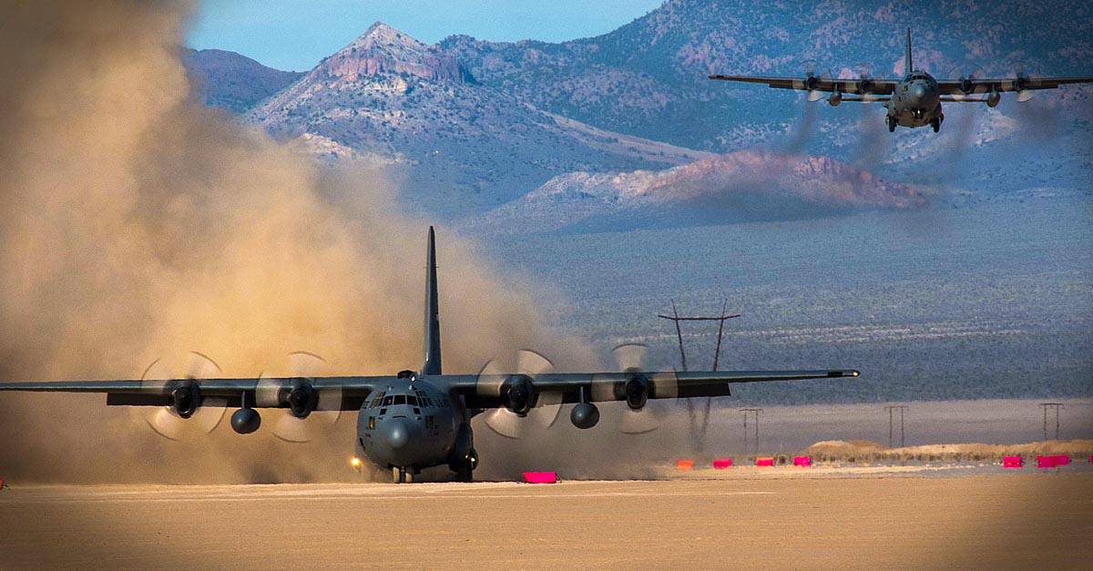 C-130_A C-130 Hercules from the 700th Airlift Squadron lands on a dry lake bed near Nellis Air Force Base, Nev.
